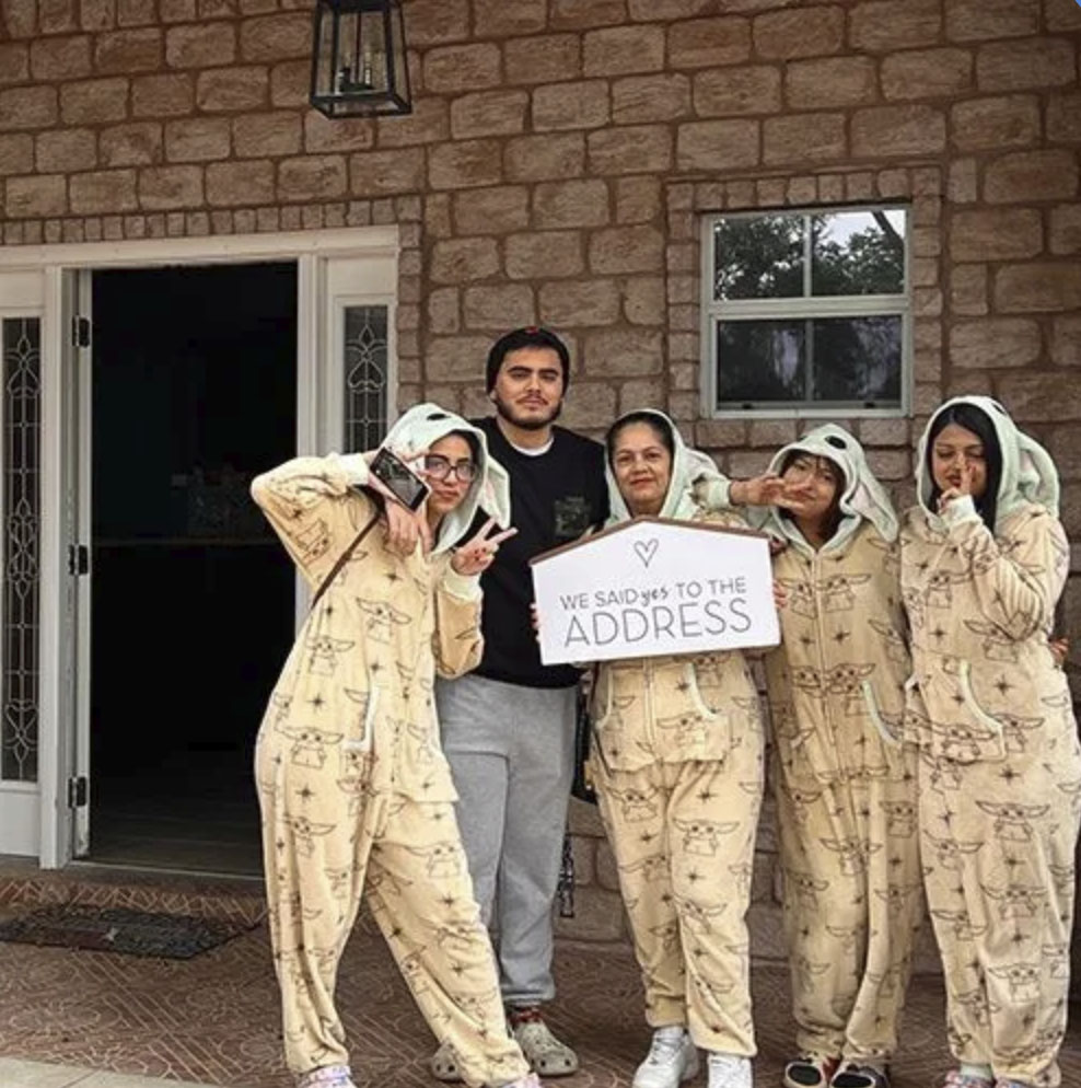 picture of Andrey P. in front of a house
