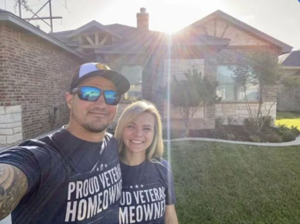 picture of Karl M. in front of a house